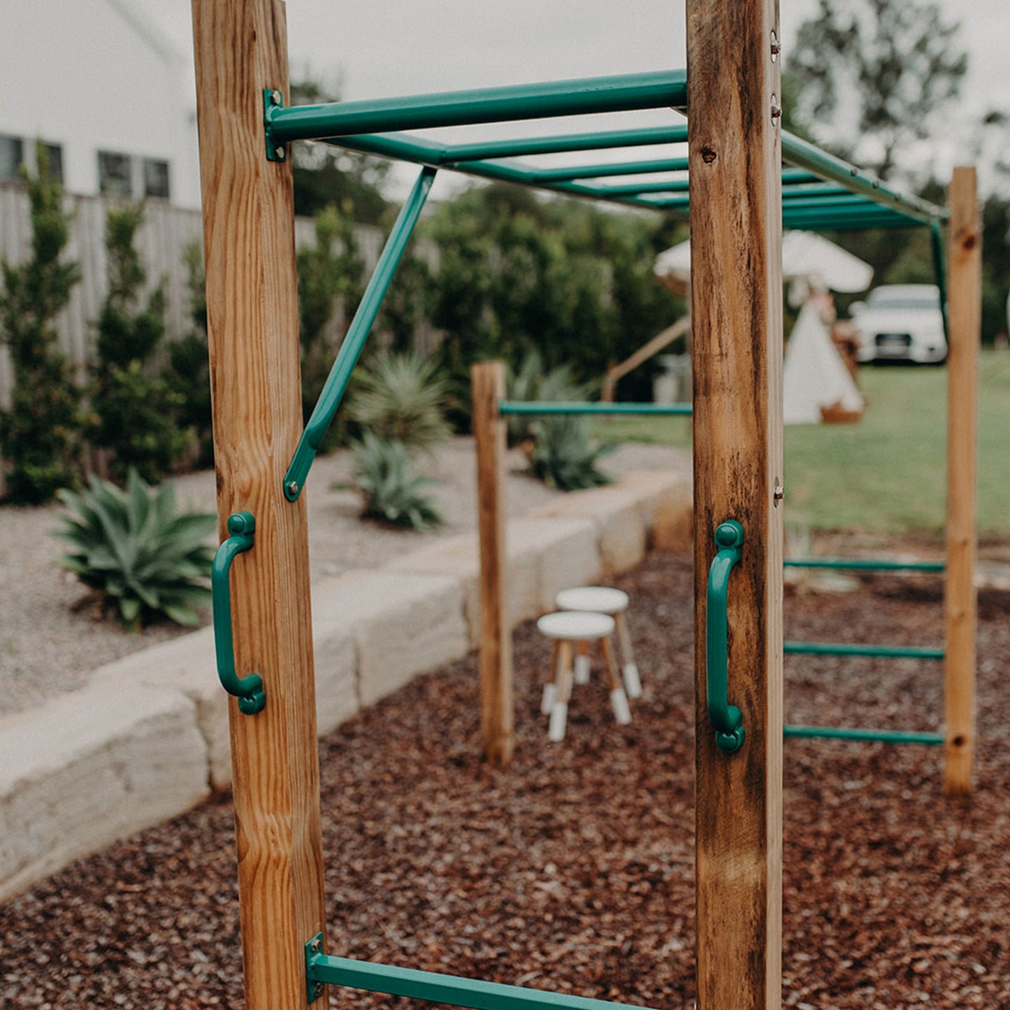 Wooden monkey bar set by Lifespan Kids for backyard playtime, ideal for childrens outdoor fun.