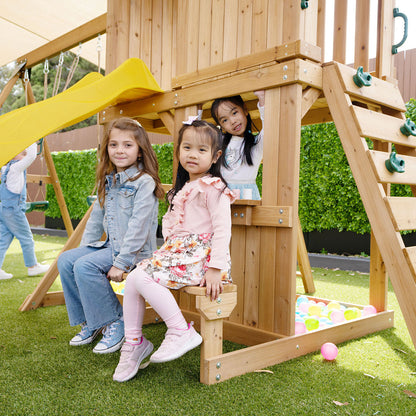 backyard playset featuring swings and a yellow slide for hours of outdoor fun and adventure.