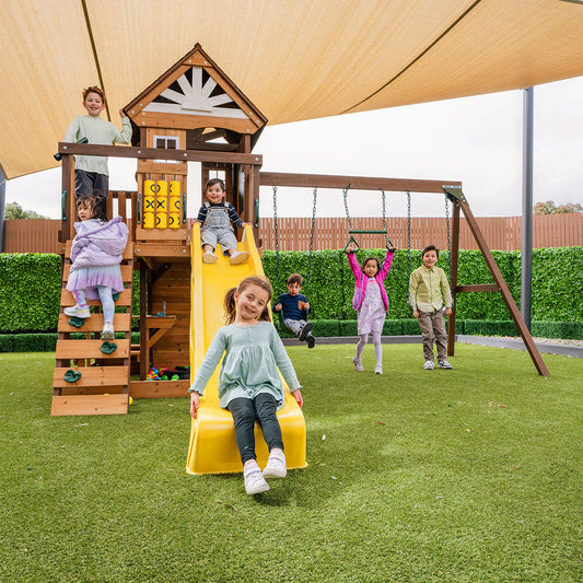 Coventry Play Centre featuring a tall yellow slide and contemporary design for outdoor family fun and adventure.