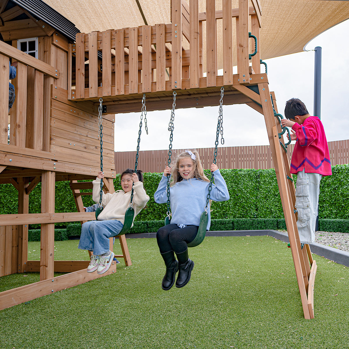 Kensington Play Centre features a towering 2.2m green slide for thrilling outdoor adventures and active playtime fun.