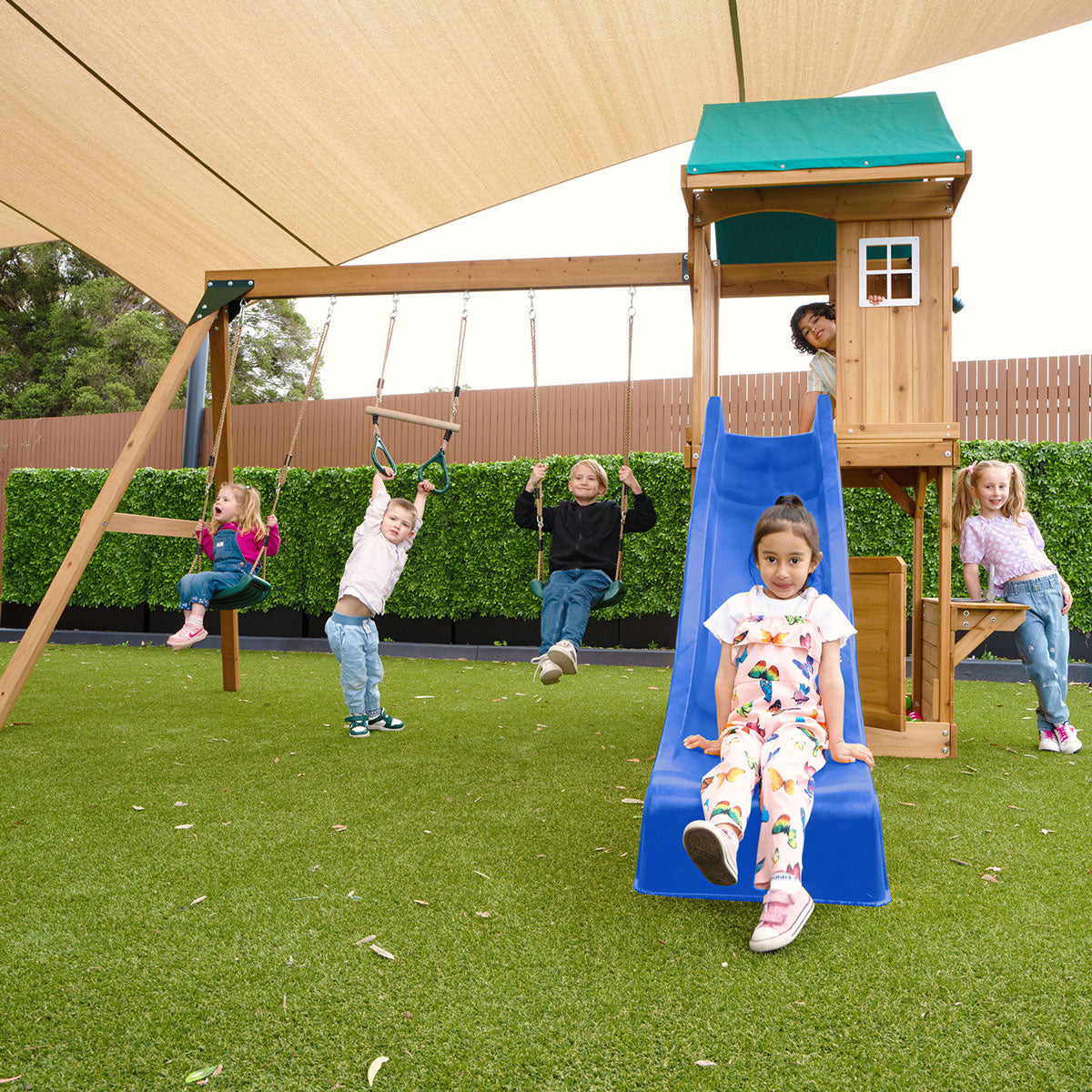 Montrose Wooden outdoor play centre with slide and swings
