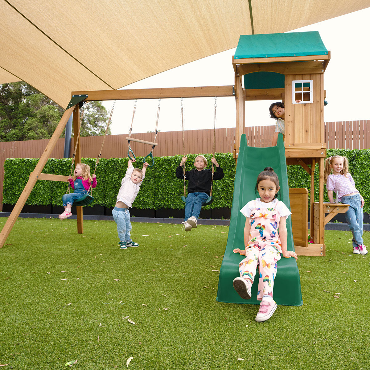 Montrose outdoor play set features a towering 2.2m green slide for thrilling backyard adventures and active fun.