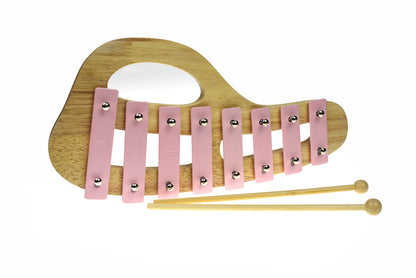 Wooden xylophone in lily pink for childrens musical exploration at home.