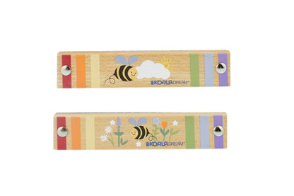 Colorful wooden bee-shaped harmonica toy encourages musical exploration and fine motor skills development in children