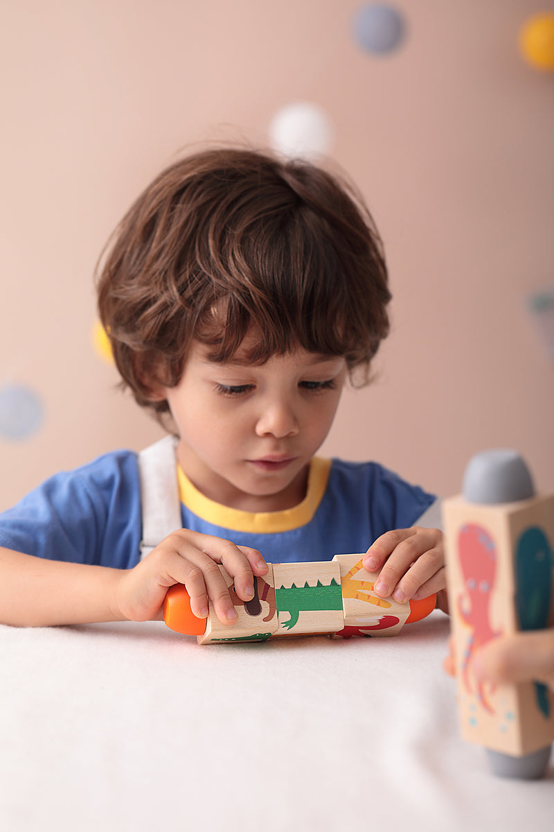 Colorful wooden sea animal puzzle block for toddlers, promoting creative play and fine motor skills.