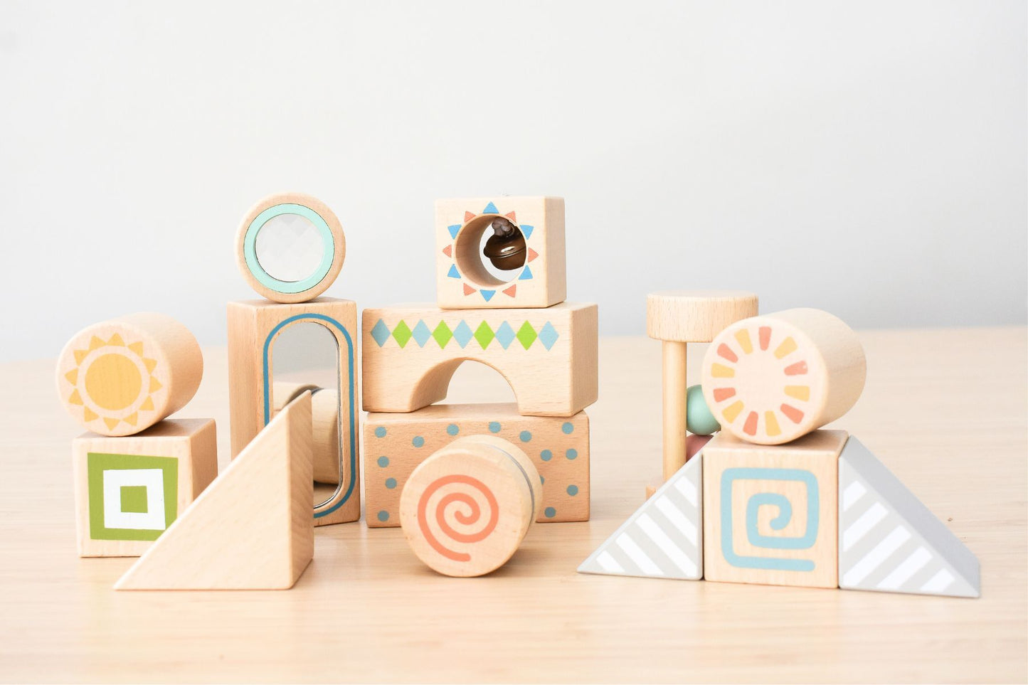 Colorful sensory wooden blocks set for creative play, ideal for kids sensory development at home.