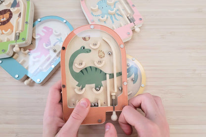 Vintage-inspired wooden pinball game set featuring six unique boards for classic tabletop entertainment and.