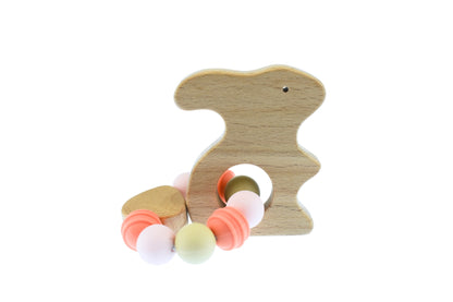 Kaper Kidz bunny teether with silicone beads, eco-friendly wooden toy for soothing teething babies.