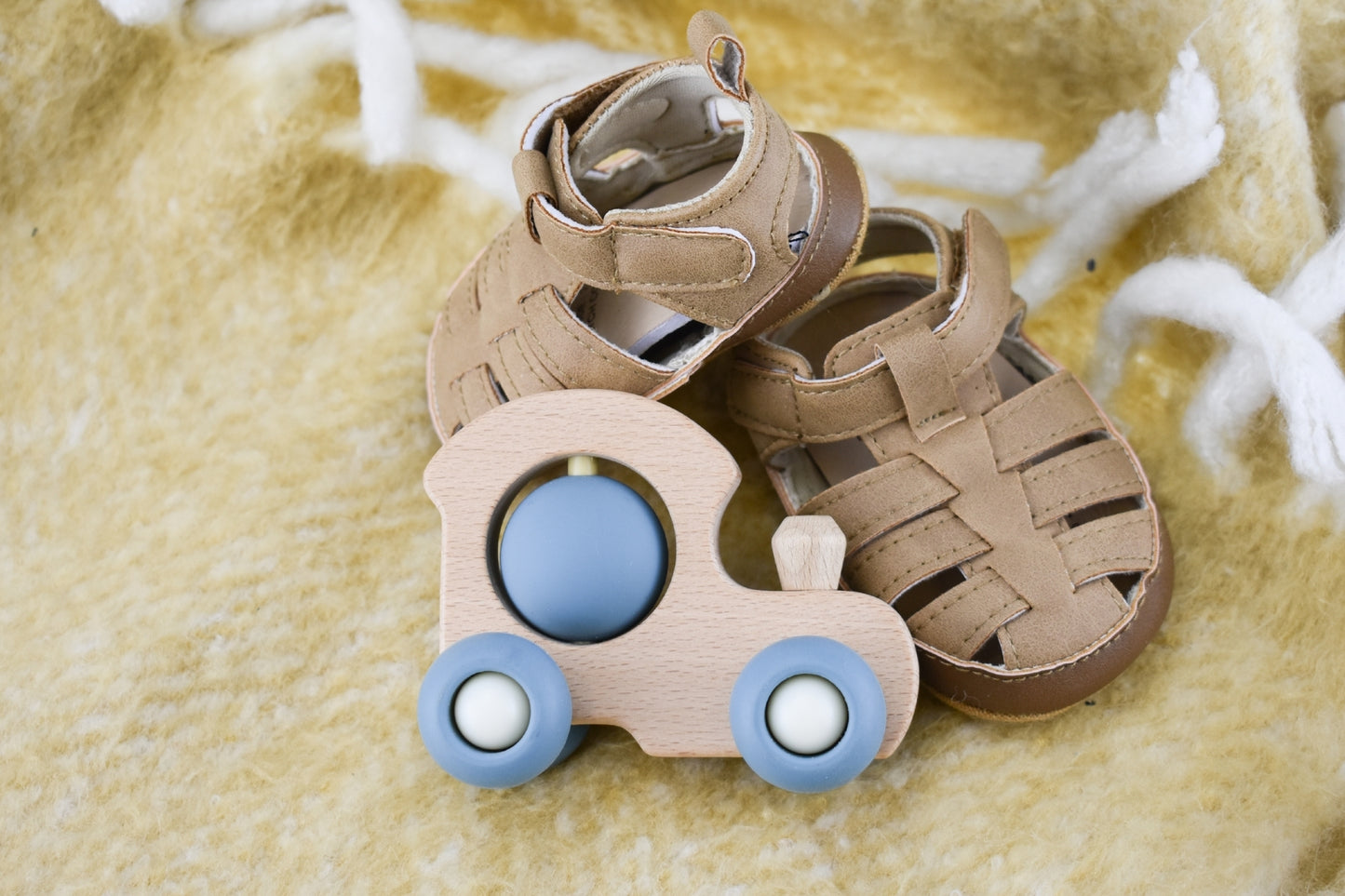 Ecospin Blue toddler train ride on toy for interactive play at home.