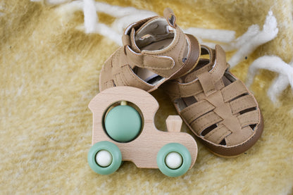 Colorful wooden train set with eco friendly design for kids imaginative play at home.