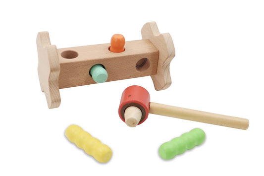 Wooden hammer bench toy for toddlers, promotes hand-eye coordination and fine motor skills.