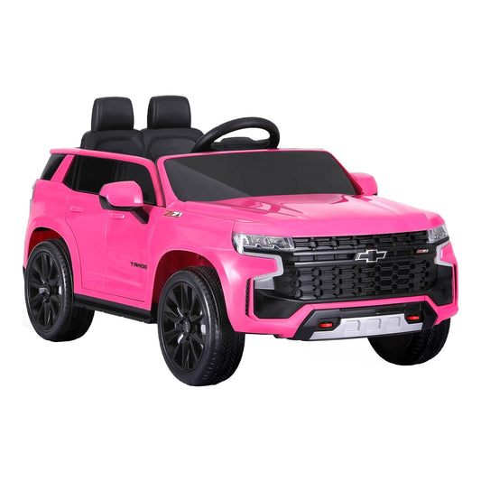Pink licensed Chevrolet Tahoe ride-on car for kids features electric power, horn, and remote control for exciting outdoor.