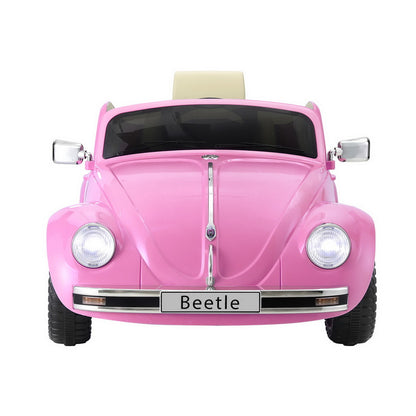 Pink VW Beetle kids ride on car, 6V electric with remote control for home fun.