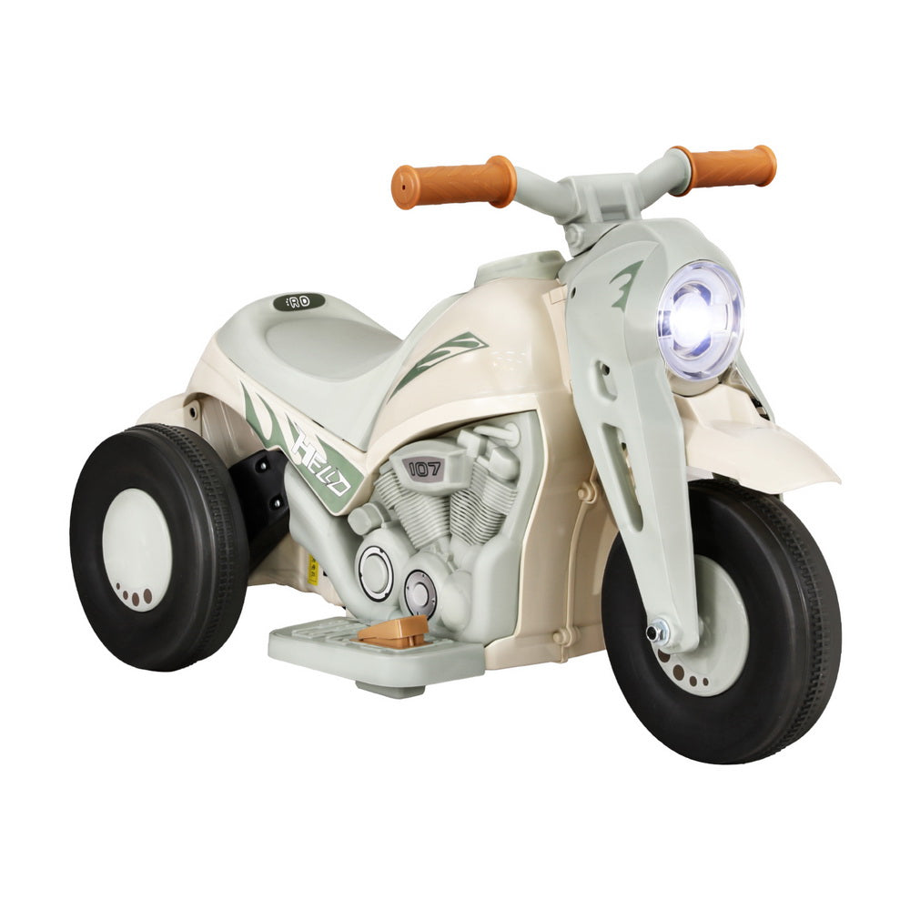 Green kids electric motorbike with bubble maker for outdoor fun at home.