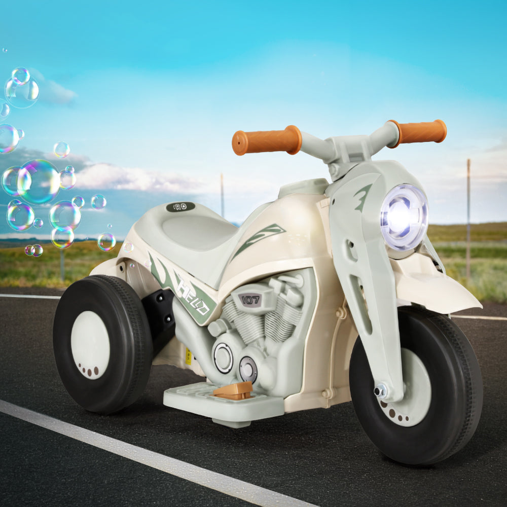 Green electric motorbike with bubble maker for kids fun rides at home.