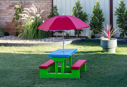 Colorful outdoor picnic table set for kids with umbrella, perfect for backyard play and meals.