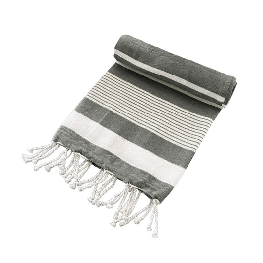 Kids black Turkish beach towel with soft cotton and playful tassels for cozy home relaxation.