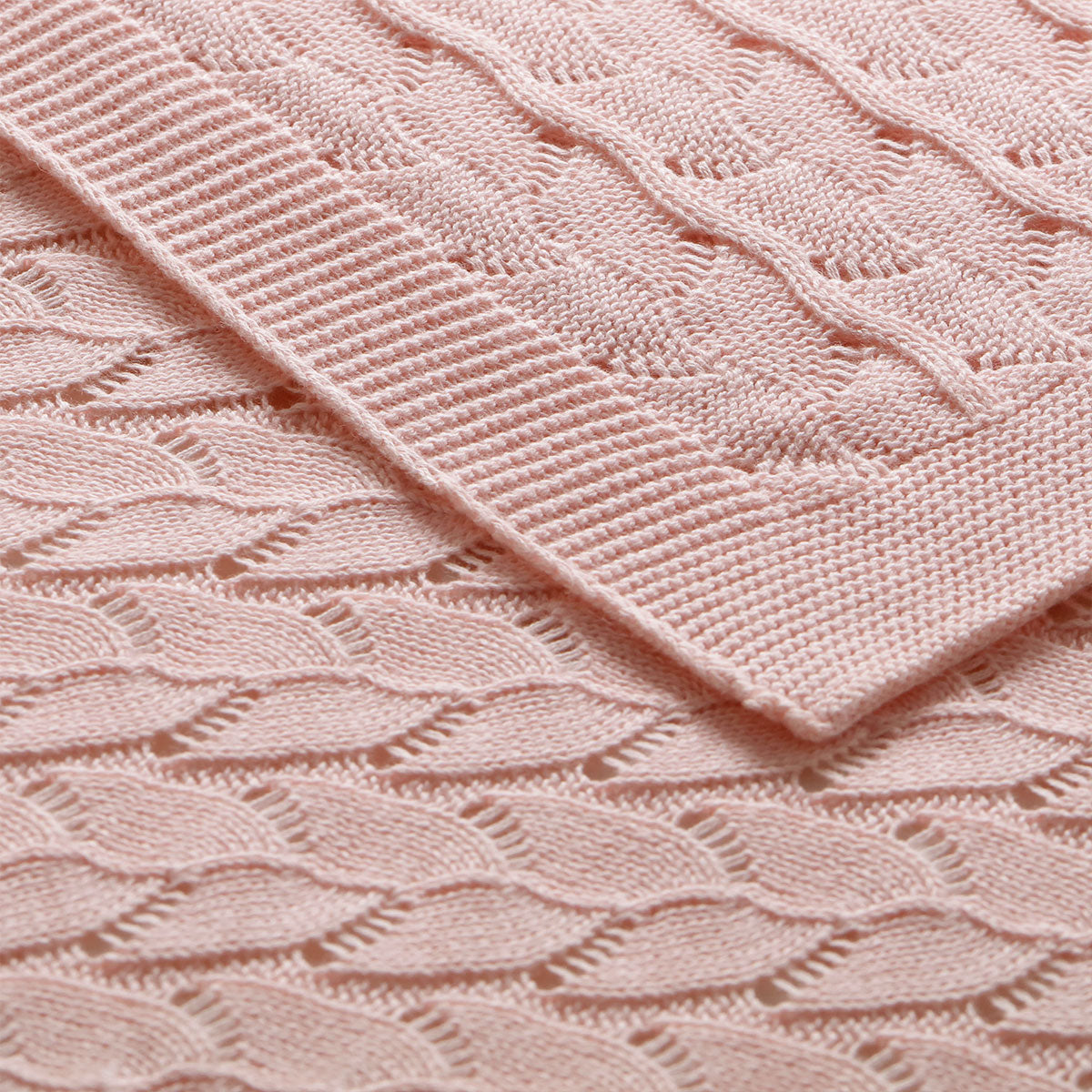 Soft organic cotton baby blanket in lyla blush color, ideal for cozy sleep time.
