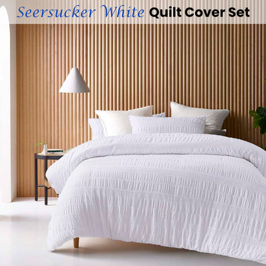 White seersucker quilt cover set with playful design for kids bedding decor.