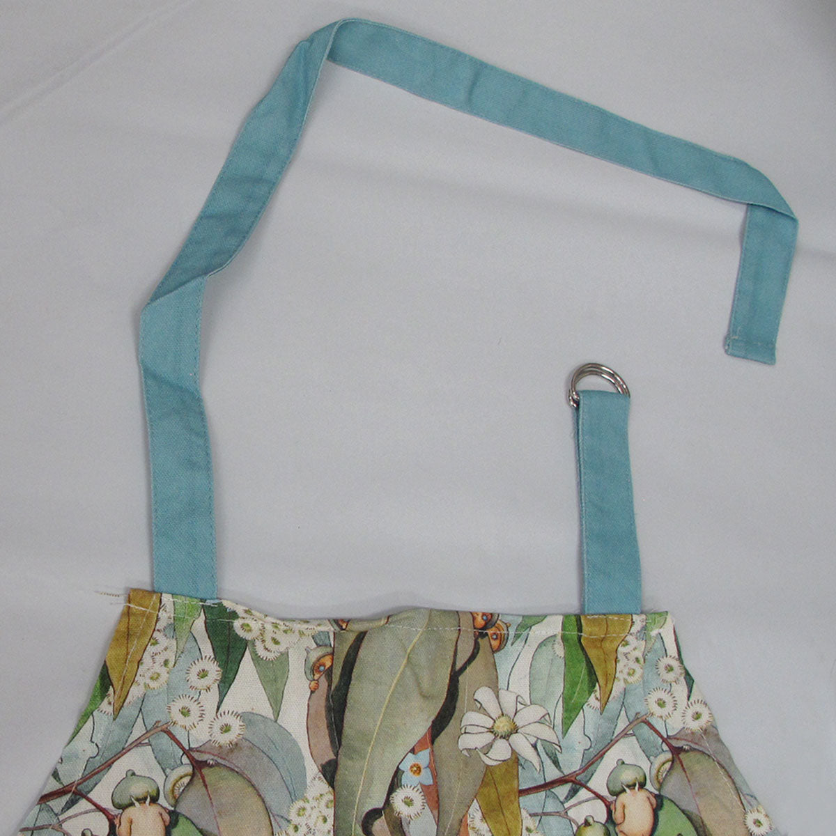 May Gibbs Gumnut Baby Cotton Kitchen Apron, 60x85cm, perfect for kids cooking activities.