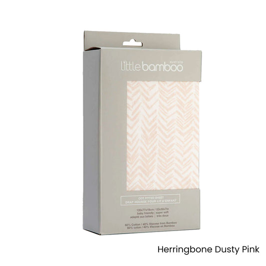 Soft jersey cot sheet in Herringbone Dusty Pink for cozy childrens bedding.