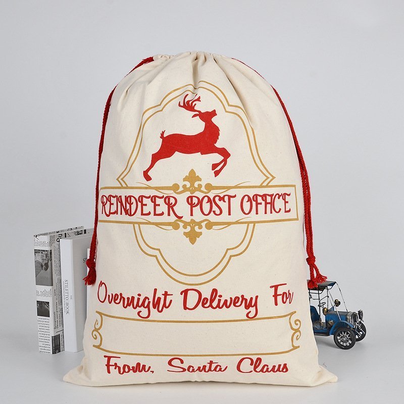Canvas Christmas gift bag featuring festive reindeer design for kids presents, home decor.