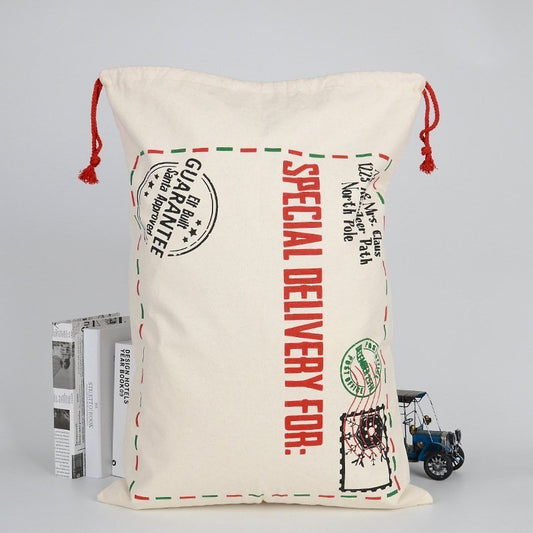 Large canvas Christmas Santa sack, perfect for kids gifts (50x70cm) - festive and spacious.