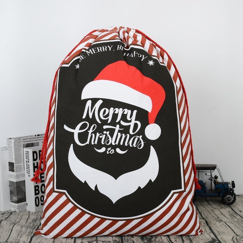 Large canvas Santa Sack gift bag with reindeer design for festive Christmas surprises.
