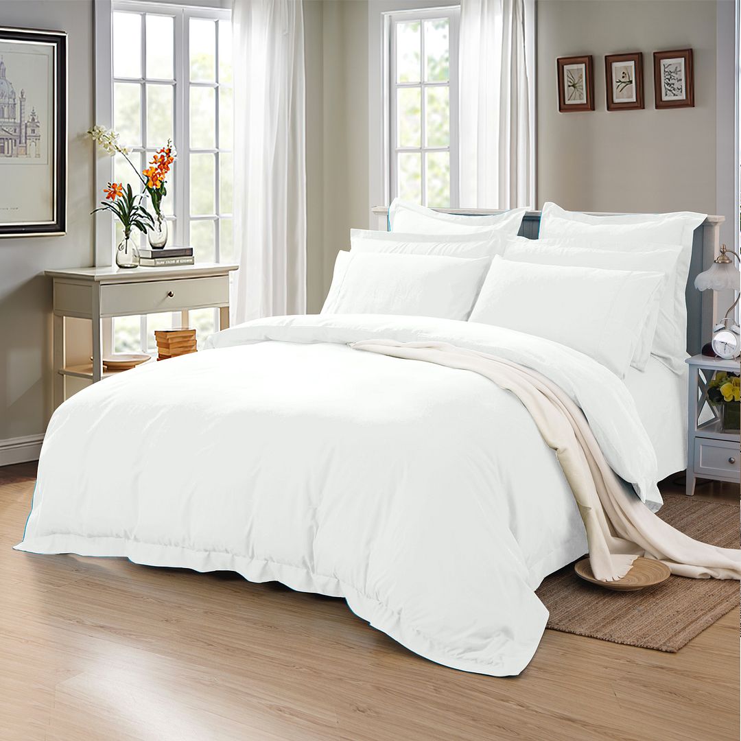 Soft white microfiber duvet cover set in multiple sizes, perfect for childrens bedrooms.