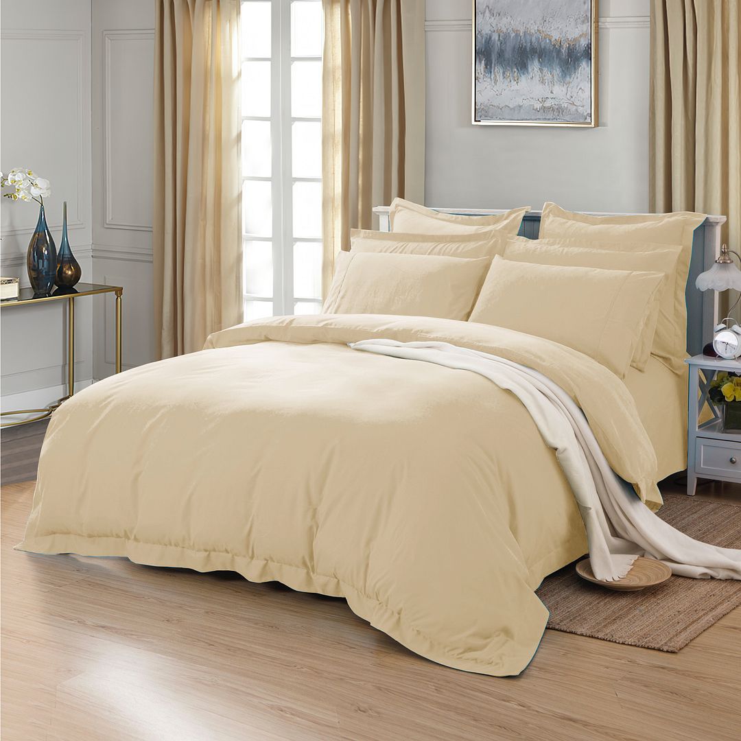 Soft yellow cream duvet cover set for kids beds - cozy, playful bedroom essential.