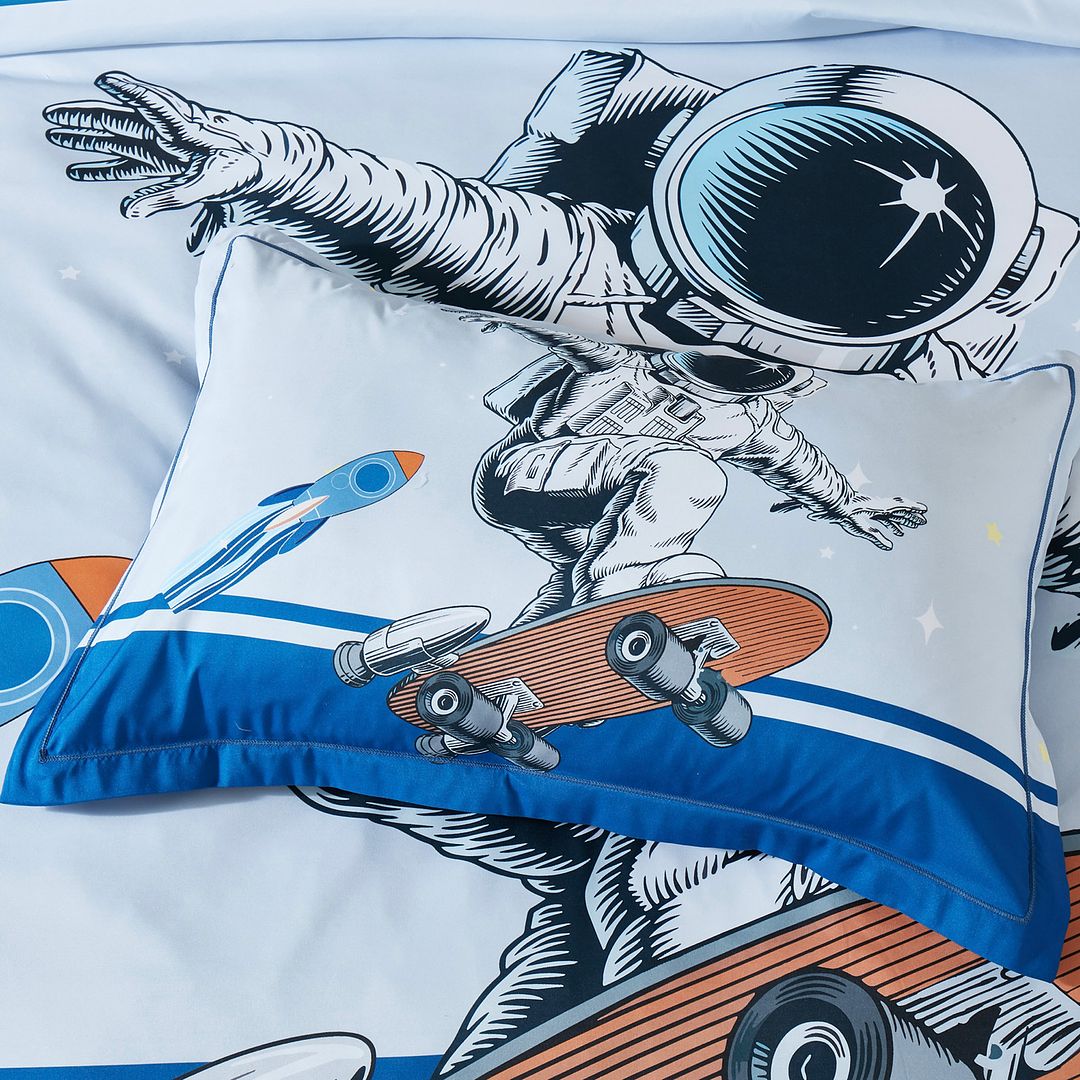 Double-size quilt cover set featuring astronaut skateboard kids design for a fun bedroom decor.