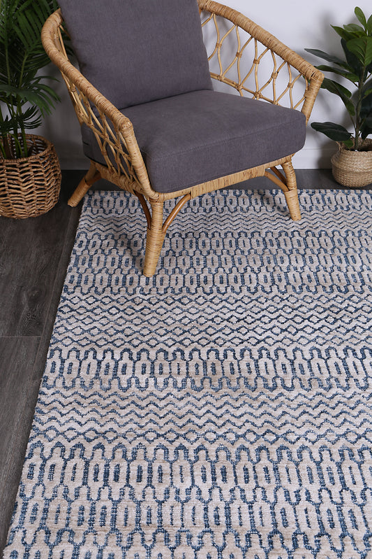 Navy Tribal Kids Rug - 240x330cm Polyester, ideal for playful and colorful childrens rooms.