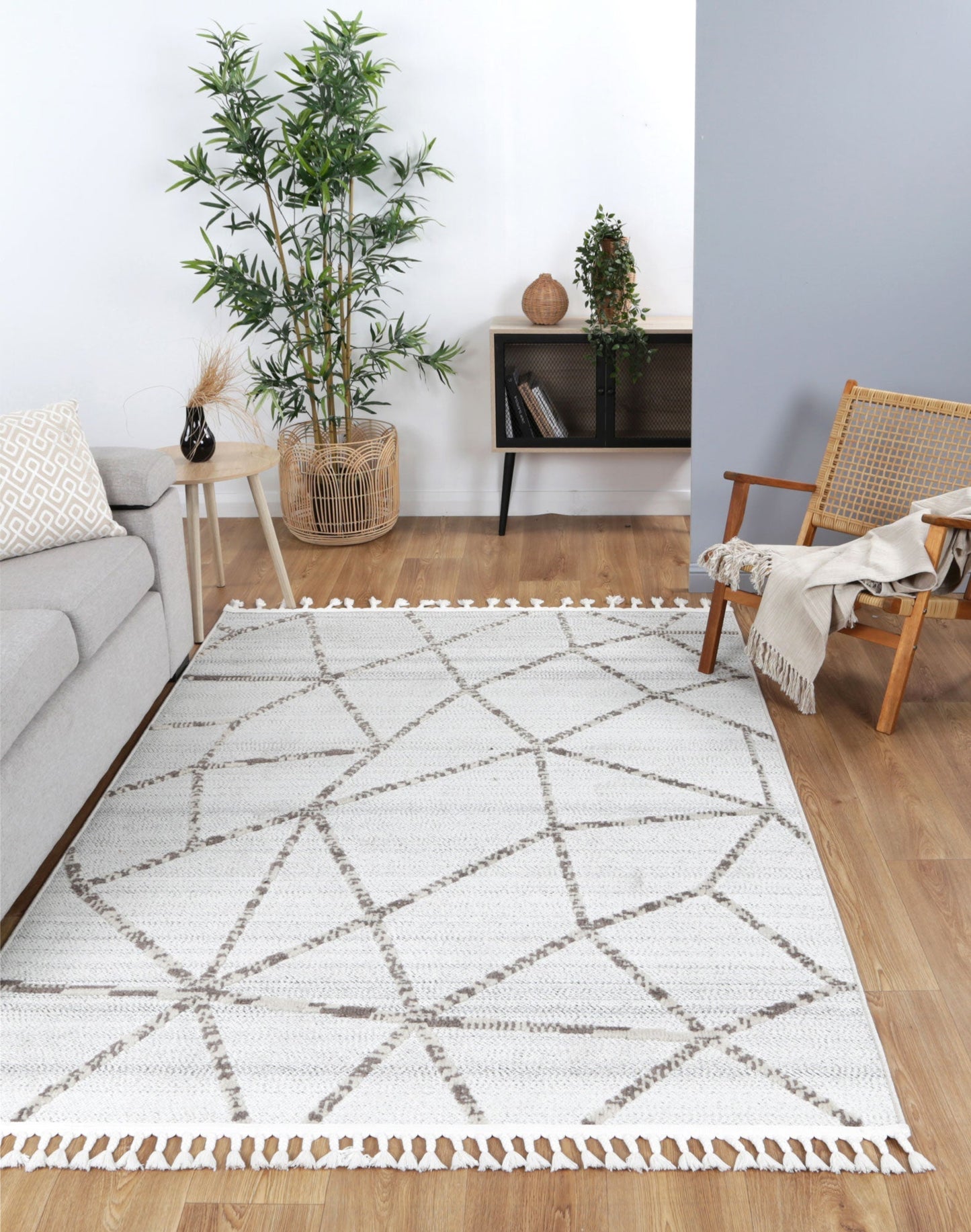 Geometric tribal rug in cream beige, child-friendly polypropylene material, ideal for playrooms.