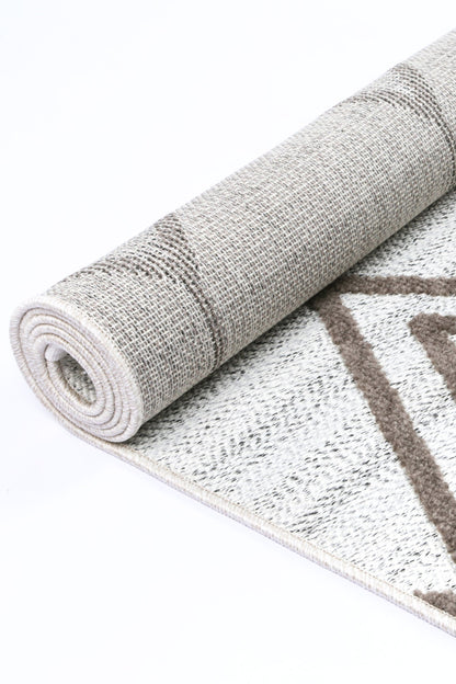 Cream beige tribal geometric runner rug perfect for adding warmth to childrens playroom decor.