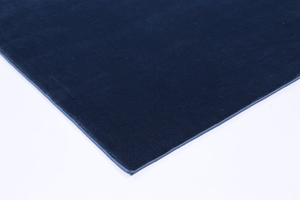 Brandon solid blue kids area rug, sized 160x230cm, perfect for cozy playrooms and bedrooms.