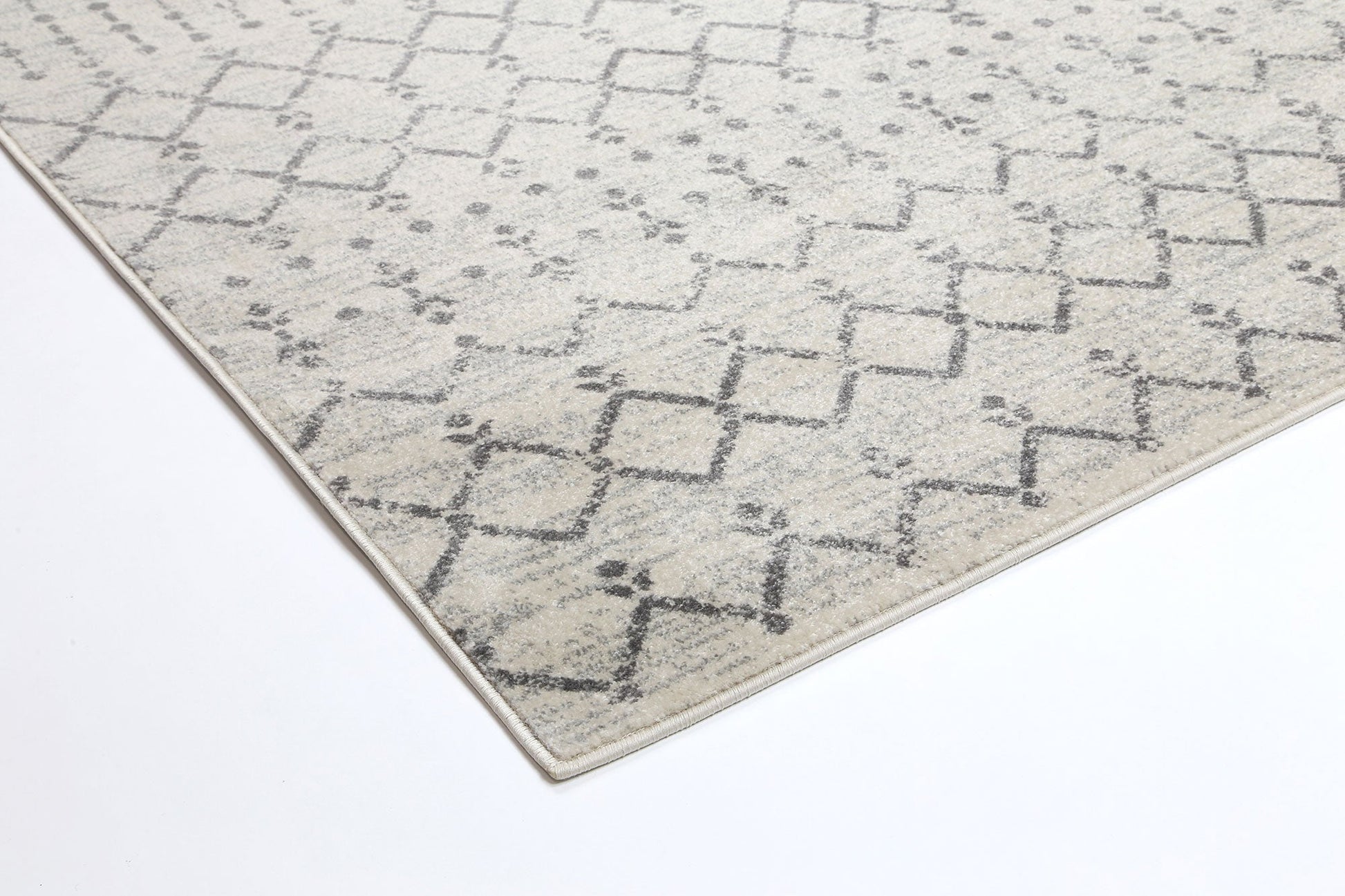 Delicate distressed rug 50x80, perfect for childrens room with transitional design.