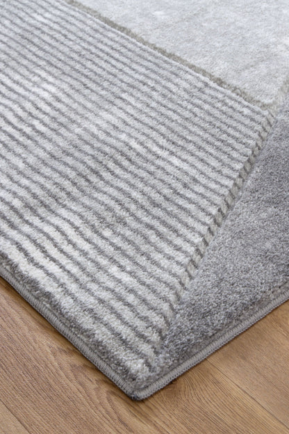 Denver Ivory Grey Area Rug offers soft polypropylene material & hand-carved design for kids rooms.