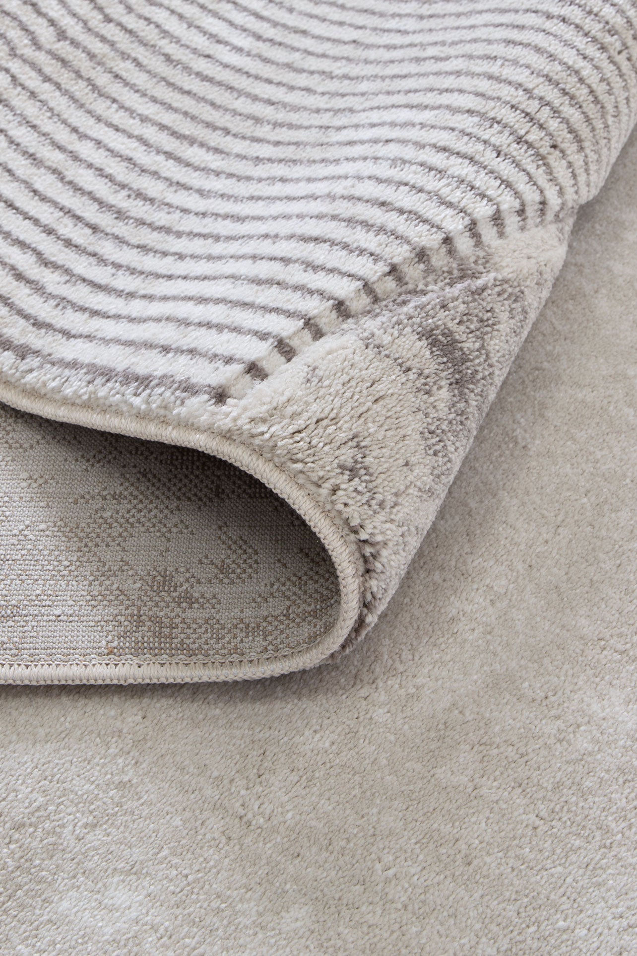 Denver Ivory & Brown Area Rug - Soft, plush hand-carved texture, ideal for kids playroom.