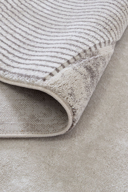 Denver Ivory & Brown Area Rug - Soft, plush hand-carved texture, ideal for kids playroom.
