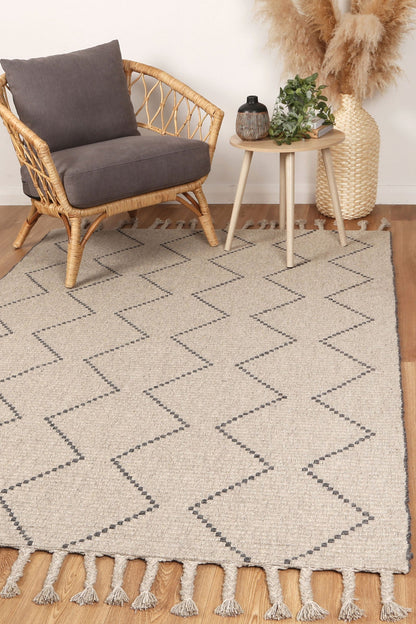 Handcrafted gray tribal rug with geometric pattern, 160x230cm, perfect for adding playfulness to kids rooms.