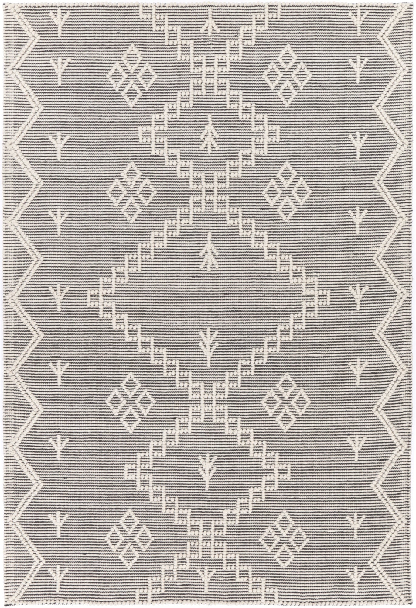 Soft cream wool blend rug with tribal pattern, perfect for kids room decor.