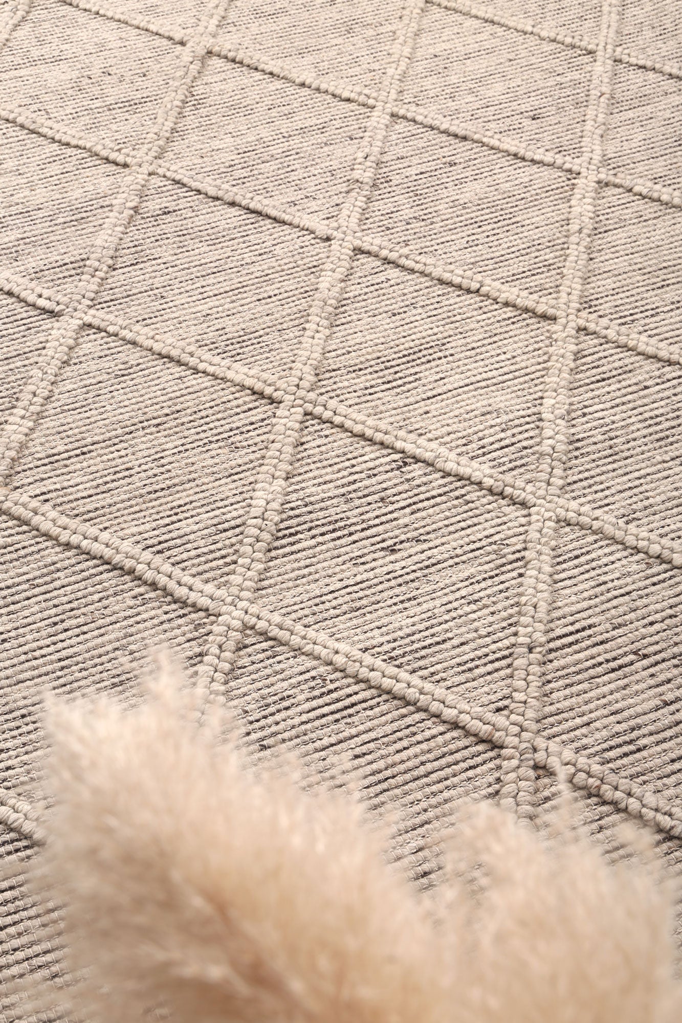 Geometric cream rug, 200x290cm, ideal for childrens room with tribal design element.