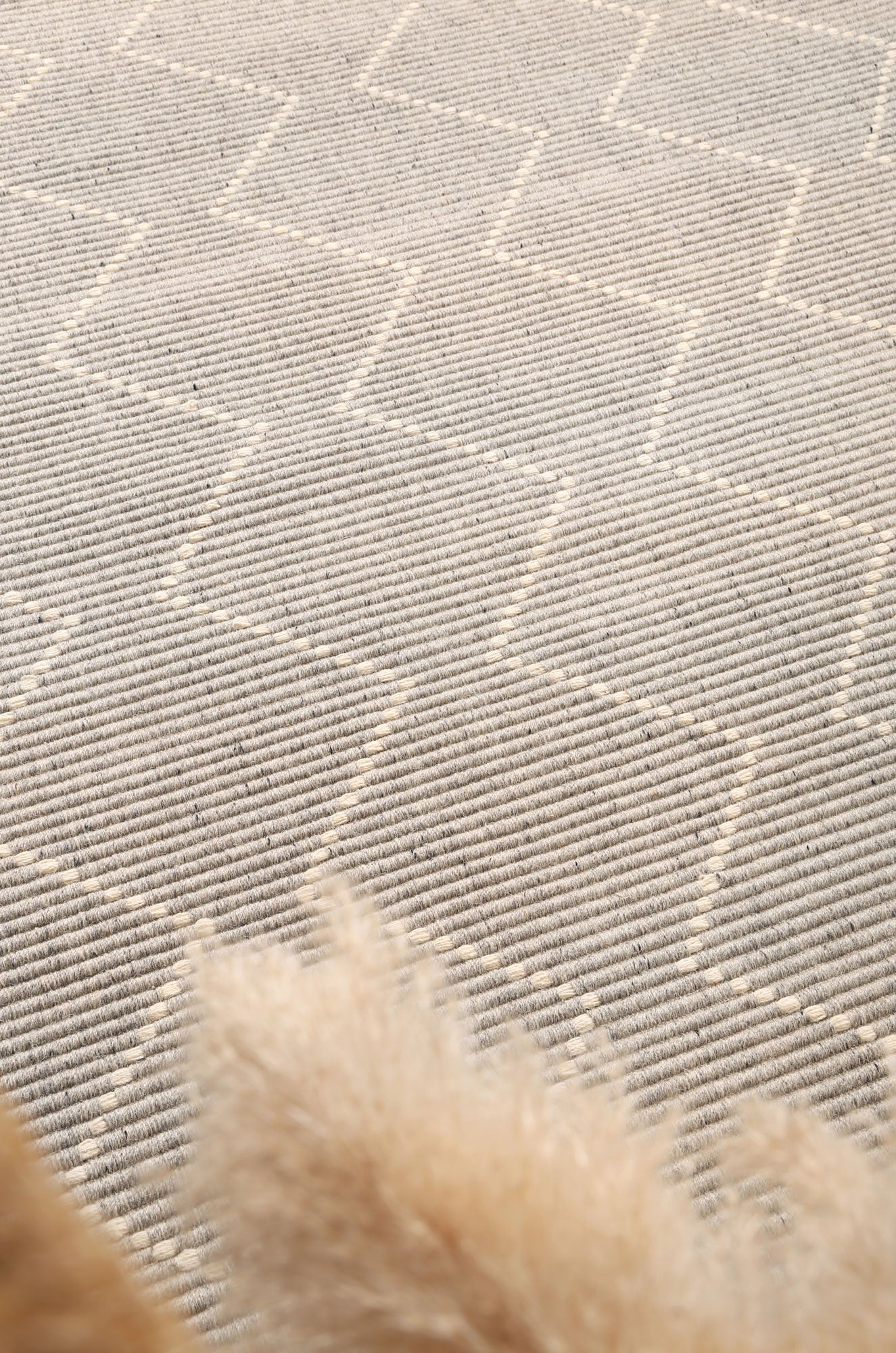 Child-friendly 200x290cm grey tribal geometric wool-blend rug, perfect for kids rooms.