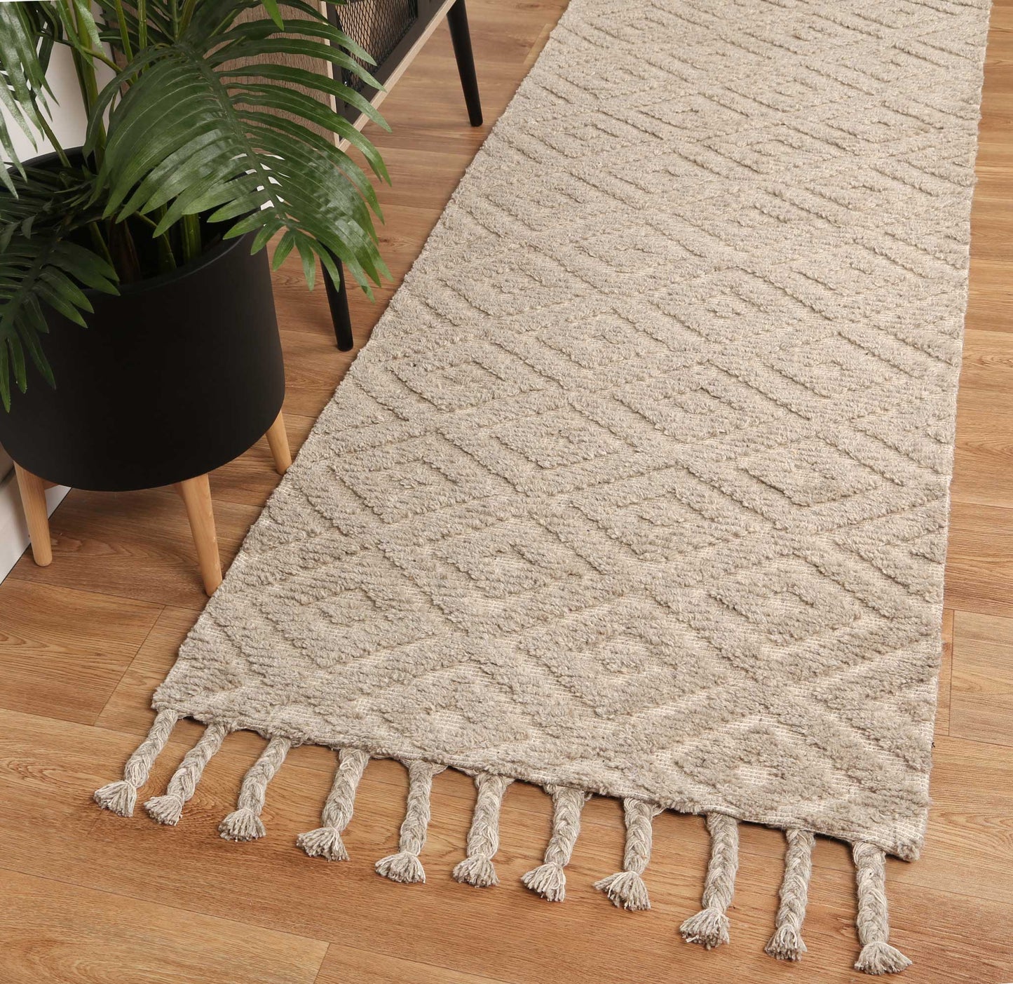 Tribal geometric hand-tufted wool blend rug designed for kids rooms, size 200x290cm.