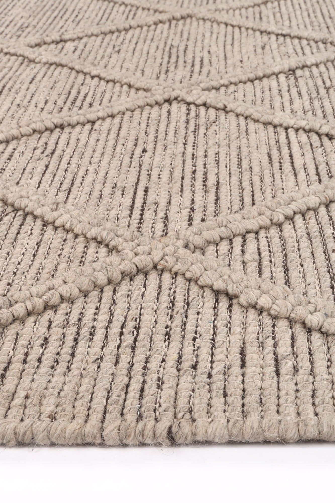 Geometric tribal wool blend rug in cream, 240x330cm, ideal for a childs playroom or bedroom.