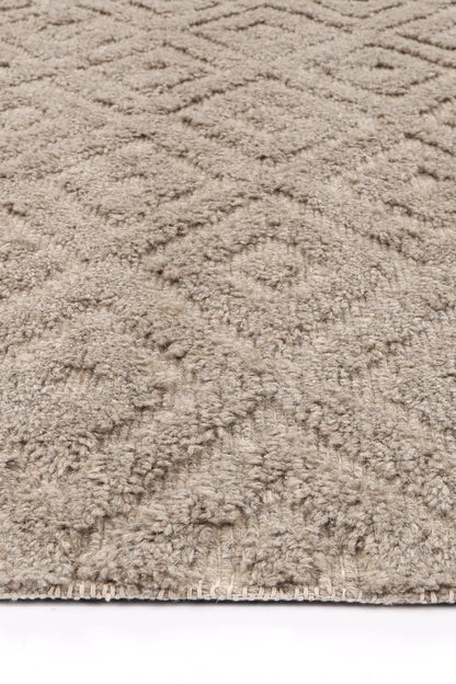 Handmade Tribal Wool Blend Area Rug with Geometric Pattern, child-friendly and vibrant design.