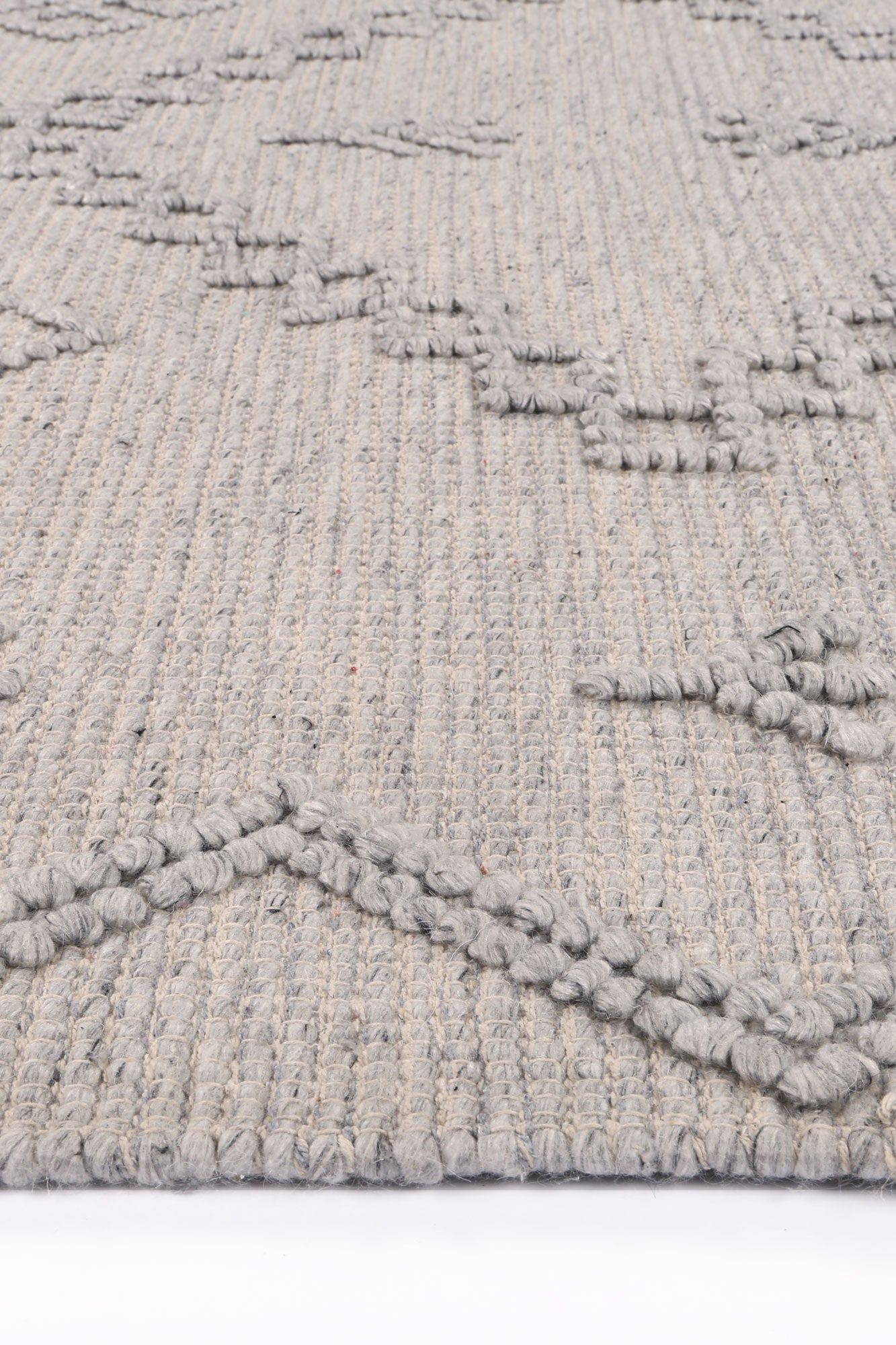 Childrens tribal wool blend area rug in grey with geometric pattern, sized 300x400 for playrooms.