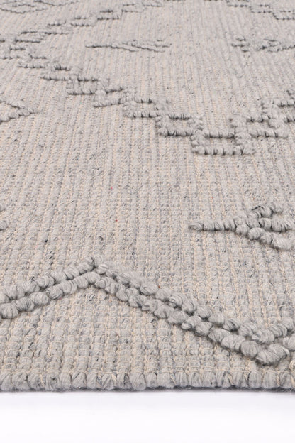Childrens tribal wool blend area rug in grey with geometric pattern, sized 300x400 for playrooms.