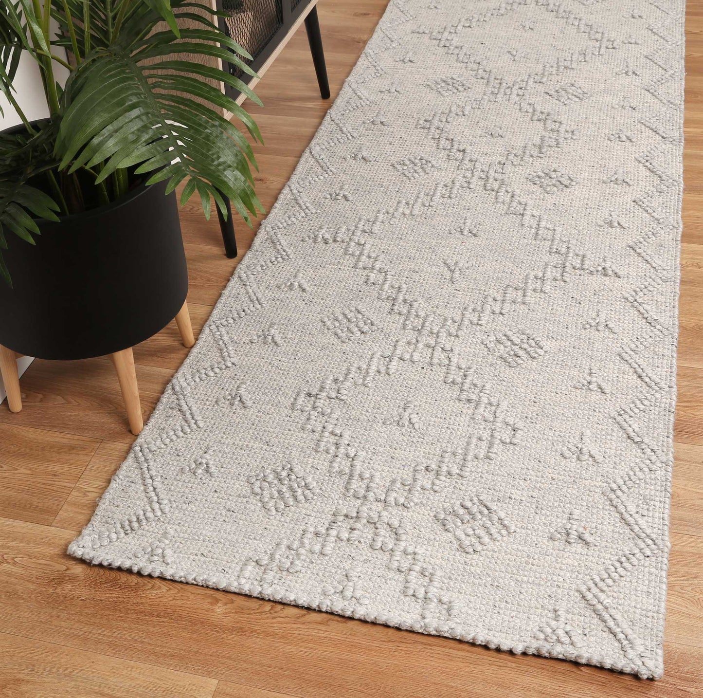 Grey geometric wool rug for kids rooms, 300x400 size, adding tribal charm and comfort.