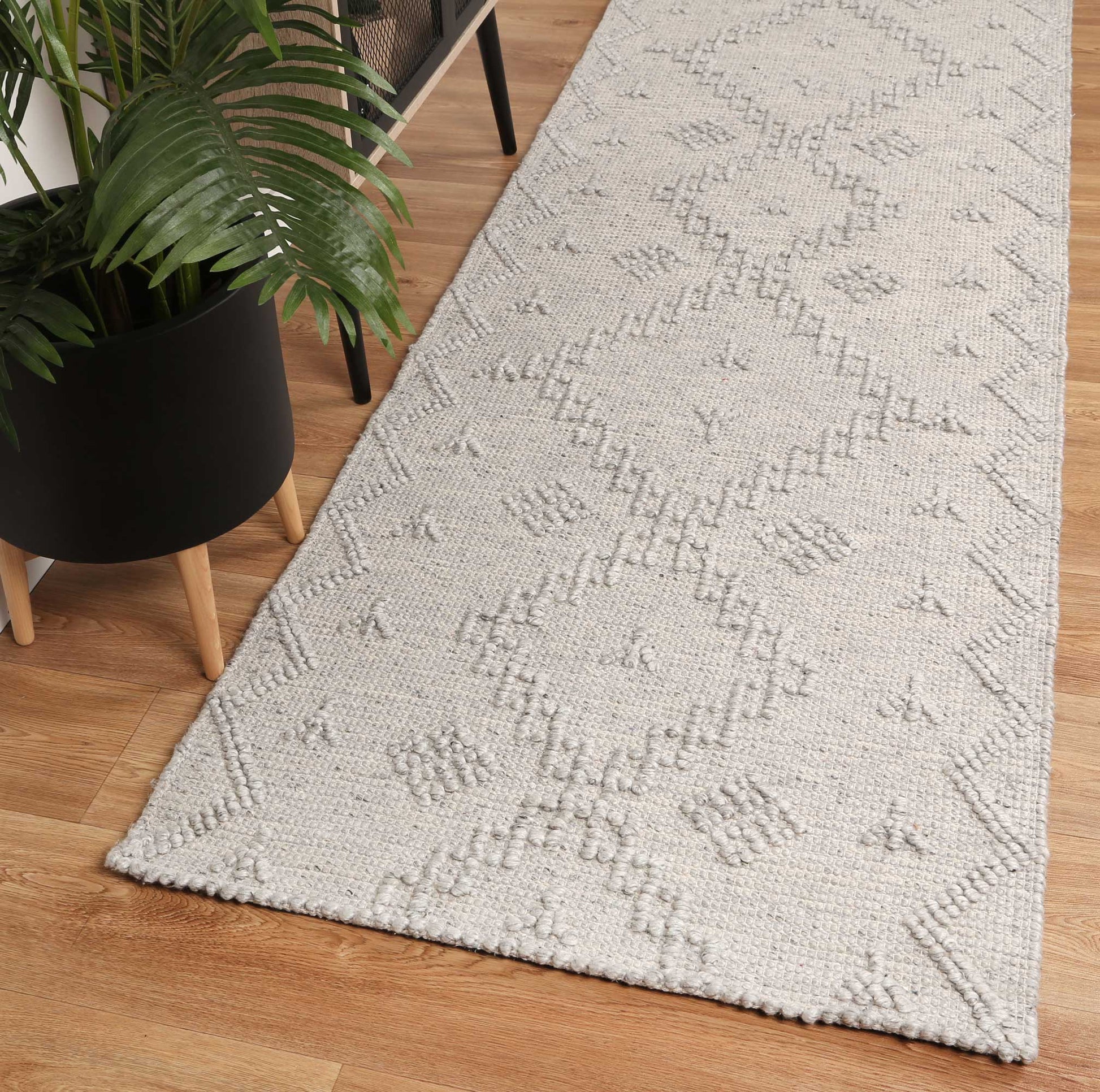 Grey geometric wool rug for kids rooms, 300x400 size, adding tribal charm and comfort.